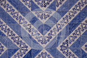 Traditional old tiles on the street Portuguese painted tin-glazed, azulejos ceramic tilework. Porto, Portugal.