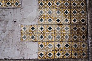 Traditional old tiles on the street walls in Porto, Portugal.