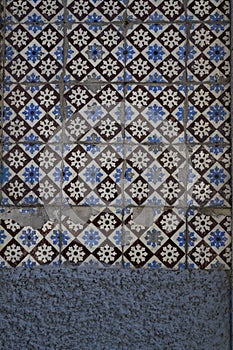 Traditional old tiles wall on the street, azulejos ceramic tilework. Porto, Portugal.