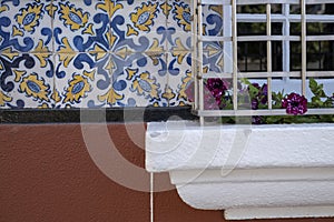 Traditional old tiles wall on the street Portuguese, azulejos ceramic tilework. Porto, Portugal.