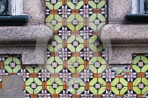 Traditional old tiles wall on the street Portuguese painted tin-glazed, azulejos ceramic tilework.