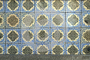 Traditional old tiles wall on the street Portuguese painted tin-glazed, azulejos ceramic tilework.