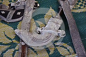 Traditional Omani silver belts and daggers