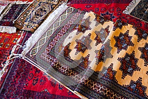 traditional oriental Asian handmade carpets at the market in Uzbekistan
