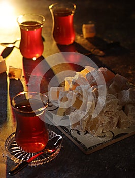 Traditional Turkish lokum with tea photo