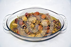 Traditional oriental dish . on tableware . Azerbaijan , Baku . Shah Pilaf . Asqara . Asgara . Ingredients soup, chestnut, plum,