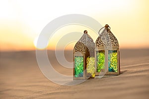 Traditional ornamental arabic candle in desert.