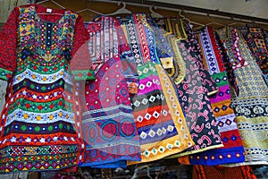 Traditional pakistani female clothes, embroidered dress