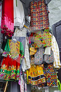 Traditional pakistani female clothes, embroidered dress