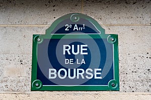 Traditional Parisian street sign with 'Rue de la Bourse' written on it, Paris, France