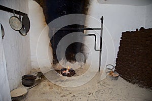 A traditional peat turf fire in an open fireplace.