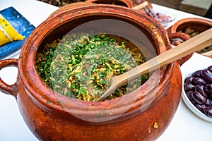 Traditional Peruvian Andean dish of Inca origin olluquito with charqui, dried alpaca meat and olluco tuber stew in a photo