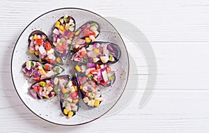 Traditional  Peruvian food background with mussels photo