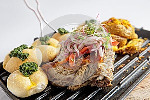 Traditional Peruvian Meal Called Chicharron de Panceta de Cerdo photo
