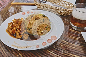 Traditional peruvian quinoa quinua chaufa and chicken, Food photo
