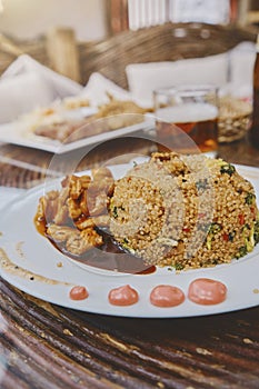 Traditional peruvian quinoa quinua chaufa and chicken, Food photo