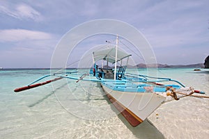 Traditional Philippines boat on the sea shore.