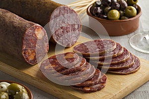 Traditional piece of Spanish Salchichon sausage and chorizo