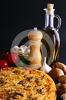 Traditional pizza and ingredients