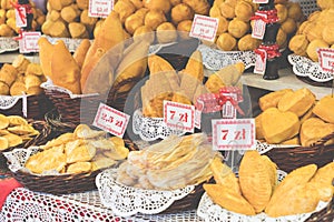 Traditional polish smoked cheese oscypek on Christmas market in