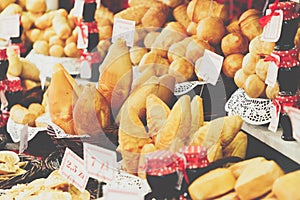 Traditional polish smoked cheese oscypek on Christmas market in