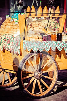 Traditional polish smoked cheese oscypek on outdoor market in Zakopane