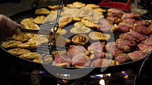 Traditional Polish street food, grilled sheep cheese at local fair on New Year's Eve and Christmas. Oscypek with