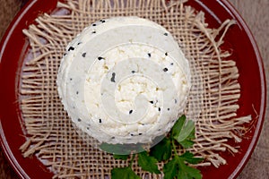 Traditional polish white cheese with black chives seeds made in North Poland in Kaszebe area near Gdynia