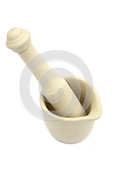 Traditional porcelain mortar and pestle, used to grind spices, o