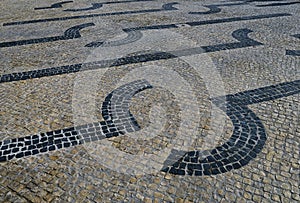 Traditional portuguese stone mosaic calcade