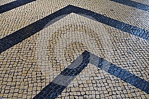 Traditional portuguese stone mosaic calcade on Lisbon