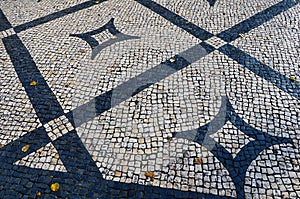 Traditional portuguese stone mosaic calcade in Lisbon