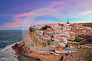 Traditional portuguese village on a cliff overlooking the ocean
