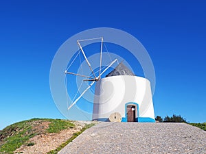 A traditional Portuguese windmill located in Odeceixe, Portugal