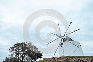 A traditional Portuguese windmill near the Algarve town of Odeceixe, Portugal - negative space composition