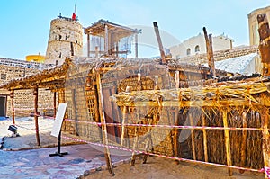 Traditional primitive house of palm branches in Al Fahidi Fort, Dubai, UAE