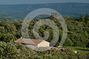 Traditional Provencal house under Luberon mountains