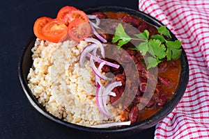 Traditional punjabi curry -Rajma masala served with rice and salad