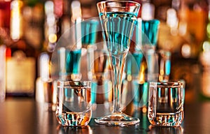 Traditional pure vodka in glasses on a black background, chilled