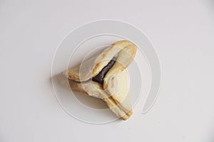 Traditional purim triangular pastry stuffed with figs