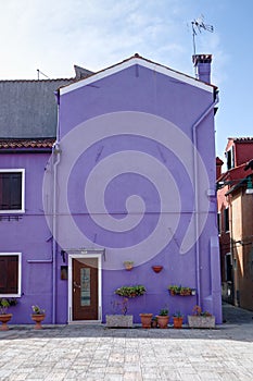 Traditional purple houses in Burano, Venice, Italy