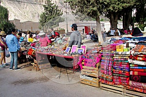 Traditional quechua colorful textil sold at the market