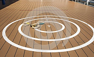 Traditional quoits on ship deck.