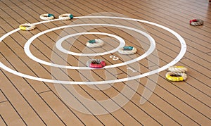 Traditional quoits on ship deck.