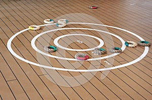 Traditional quoits on ship deck.