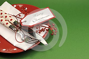 Traditional red and green Merry Christmas dinner or lunch table place setting