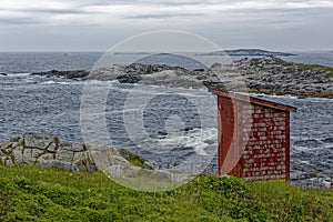 Traditional  red outhouse