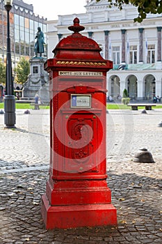 Traditional red postbox in Liège