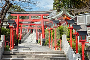 Traditional red torii gates leading to Sankou Inari Shrine at Inuyama Castle, Aichi Prefecture, Japan