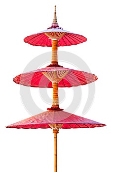 Traditional red umbrella bamboo Mulberry paper from North of Thailand photo